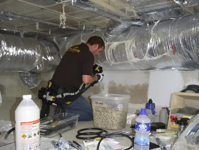 Weston Air Duct Cleaning specialist performing professional mold removal from air ducts in Weston
