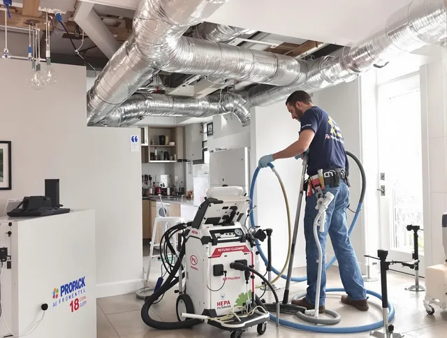 Weston Air Duct Cleaning technician performing advanced pure duct cleaning with specialized equipment in Weston